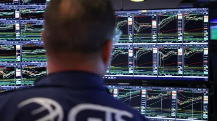 Wall Street opens little changed as focus moves to economic data