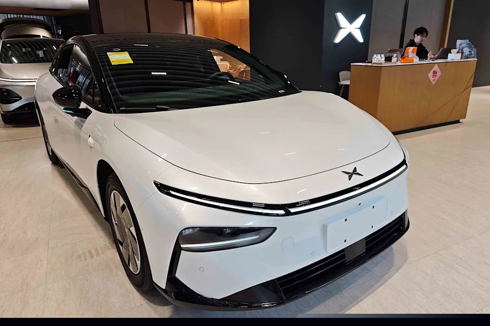 XPeng Stock Slumps as EV Maker's Loss Narrows Less Than Expected